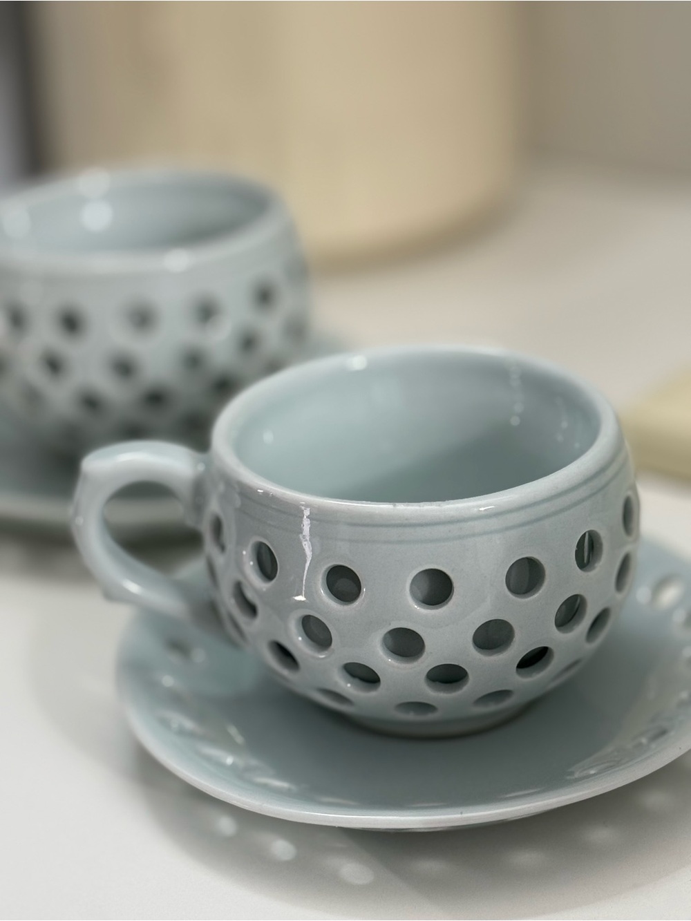 Pierced Double Walled Glazed Porcelain Teacup & Saucer Set of 2 in Light Gray